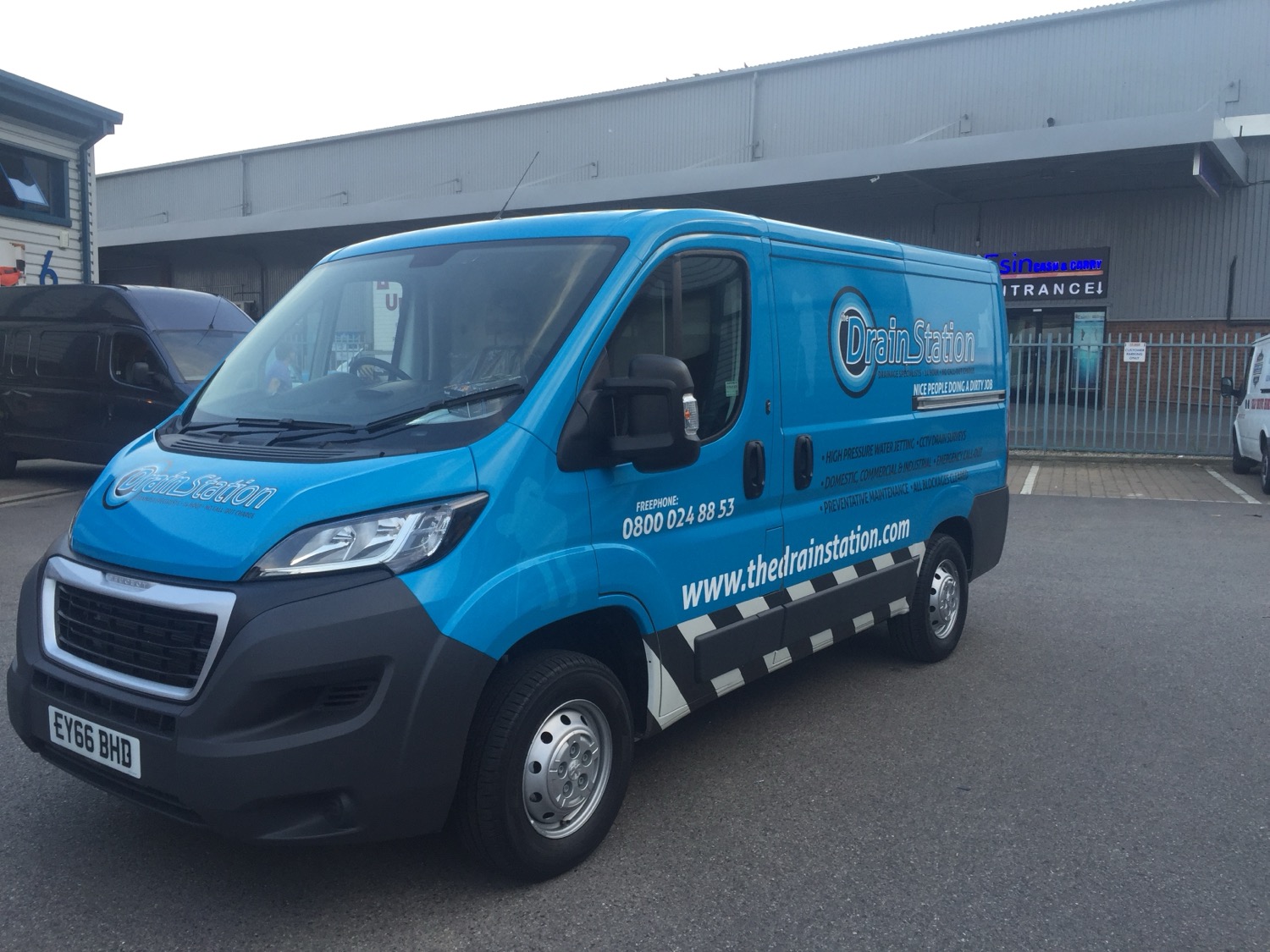 The Drain Station branded service van